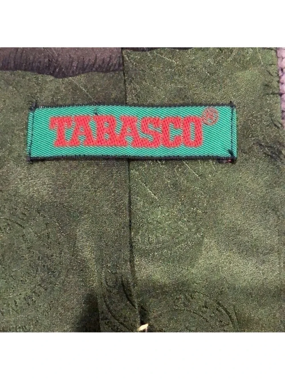 Tabasco golf themed tie.